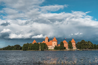 Panoramic view of trakai historical castle in a lake island against sky