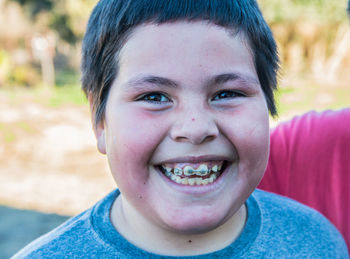 Close-up portrait of a smiling boy