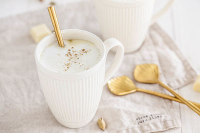 High angle view of coffee cup on table