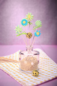 Close-up of flower vase on table