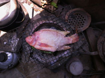 High angle view of meat on barbecue grill
