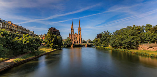 Bridge over river against sky