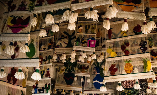 Variety of hangings displayed for sale at store