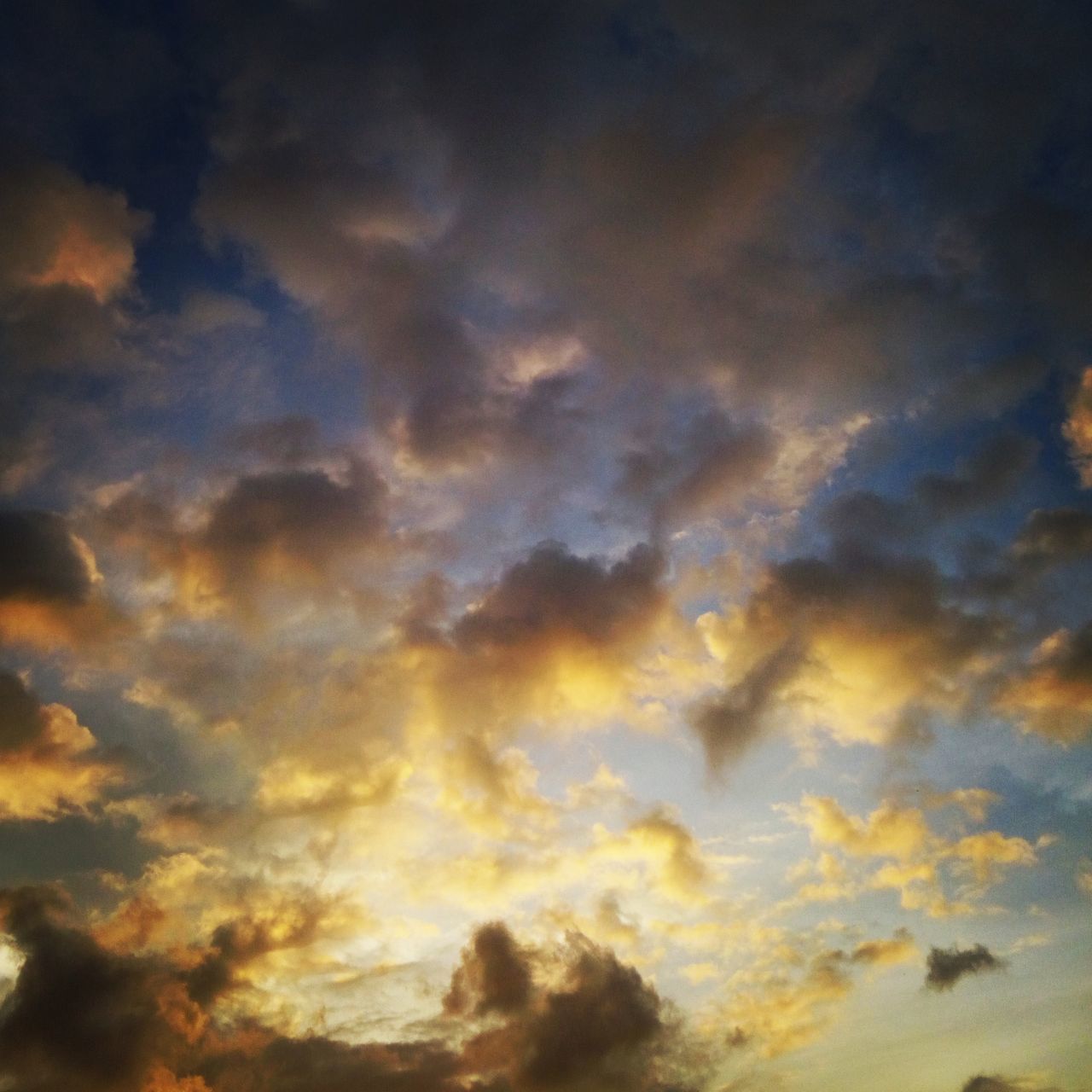 cloud - sky, beauty in nature, sky, nature, low angle view, dramatic sky, scenics, majestic, sky only, weather, cloudscape, backgrounds, sunset, no people, tranquil scene, tranquility, outdoors, idyllic, abstract, awe, multi colored, full frame, blue, day, storm cloud