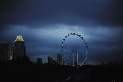 Low angle view of ferris wheel against sky