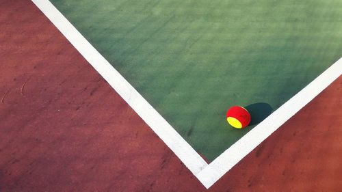 High angle view of tennis ball in court