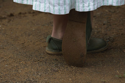 Low section of women standing on ground