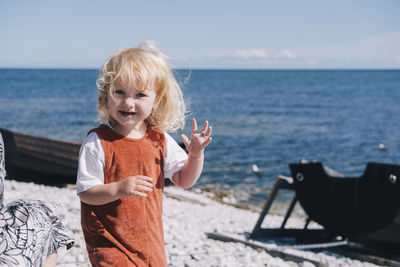 Portrait of blond girl at beach
