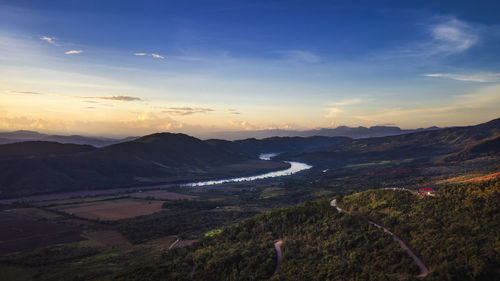 Scenic view of landscape against sky during sunset