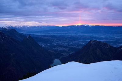 Scenic view of mountains against sky during sunset