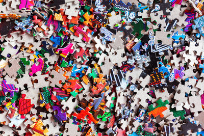 High angle view of multi colored umbrellas on table