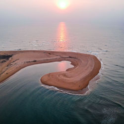 Scenic view of sea during sunset