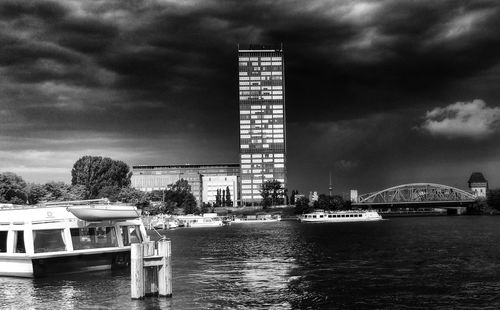 View of buildings against cloudy sky