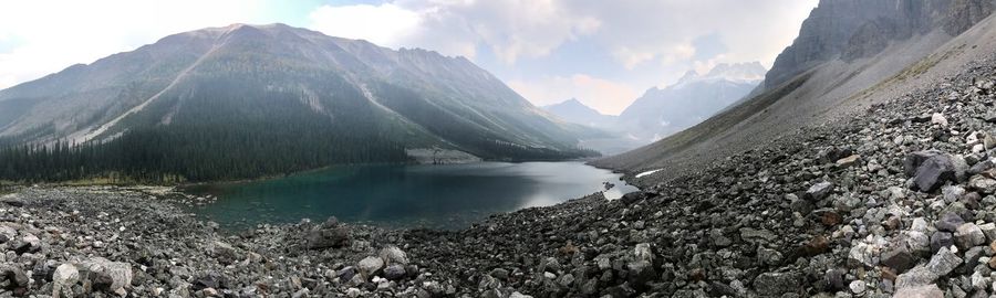Panoramic view of lake and mountains against sky