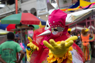 People dressed in venice carnival style are seen during the carnival