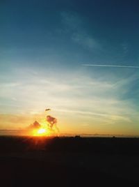 Sun shining over landscape