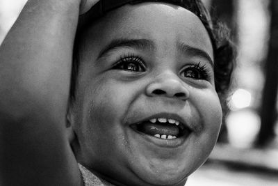 Close-up portrait of smiling boy