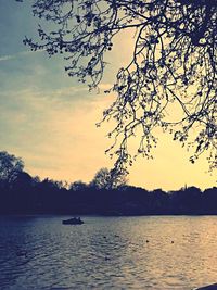 Scenic view of lake at sunset