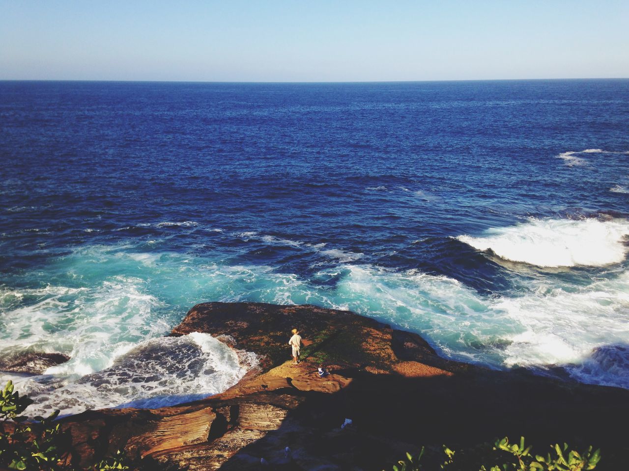 sea, water, horizon over water, scenics, wave, surf, beauty in nature, tranquil scene, nature, clear sky, tranquility, high angle view, shore, rippled, idyllic, beach, rock - object, coastline, motion, sky