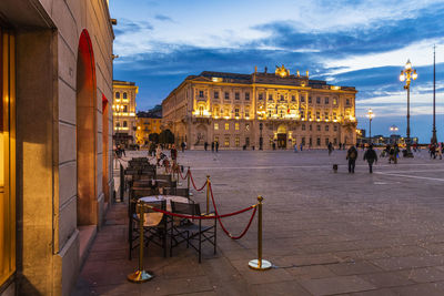 Buildings in city at dusk