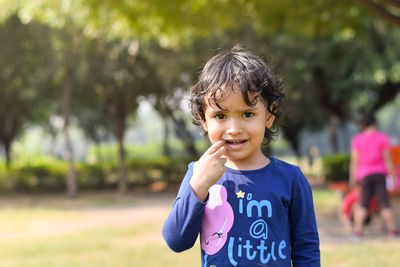 Portrait of cute smiling girl outdoors