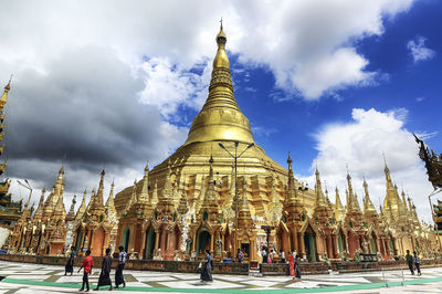 Group of people in temple against building