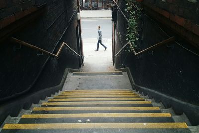 Man walking on stairs