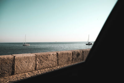 Scenic view of sea against clear sky