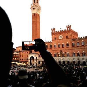 Group of people in front of historical building