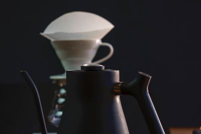 Close-up of coffee cup on table
