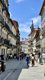People walking on street in city