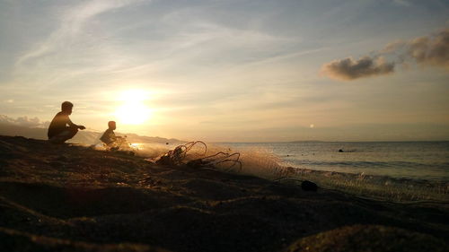 Scenic view of sea at sunset