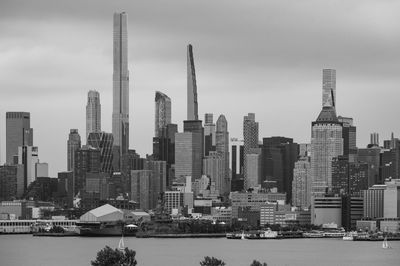 Modern buildings in city against sky