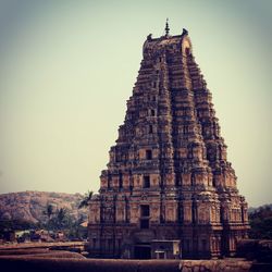 Ancient temple against sky