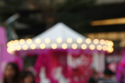 Defocused image of people at music concert