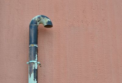 Close-up of pipe on wall