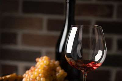 Close-up of wineglass on table