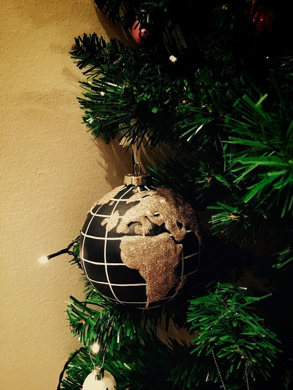 CLOSE-UP OF CHRISTMAS TREE ON PLANT