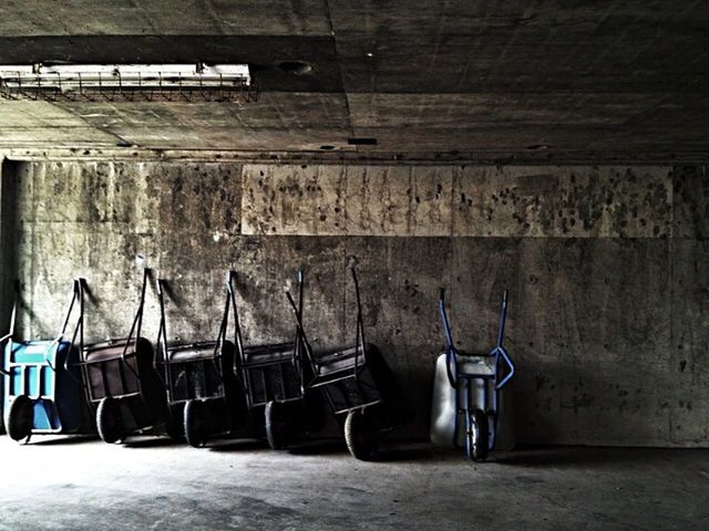 indoors, table, empty, absence, still life, chair, wood - material, no people, old, metal, old-fashioned, seat, abandoned, container, bottle, furniture, day, kitchen utensil, flooring, wall - building feature