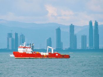Ship in sea against sky