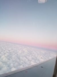 Scenic view of cloudscape seen from airplane window