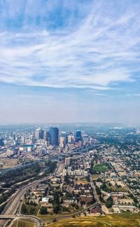 High angle view of buildings in city against sky