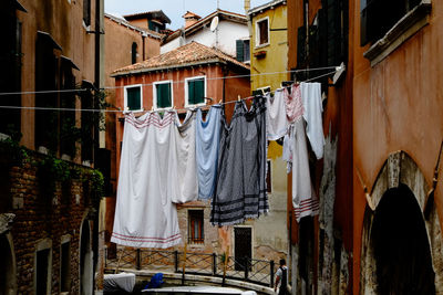 Clothes drying amidst buildings in town