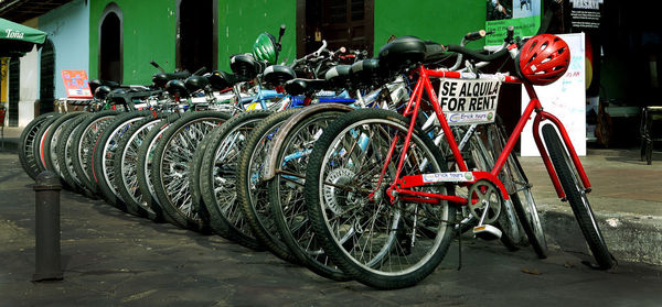 Bicycle parked on street in city