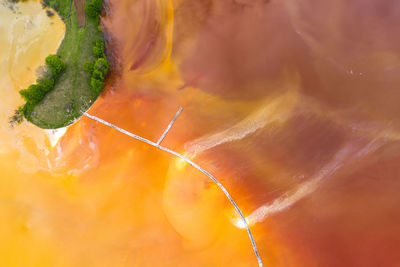 Aerial view of chemical mining waste residuals flooding into a settling basin. geamana, romania