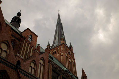 Low angle view of historic building against sky