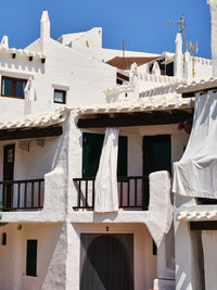 Binibeca vell white village architecture in menorca island, spain