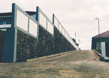 Wall fence and entrance to a building.