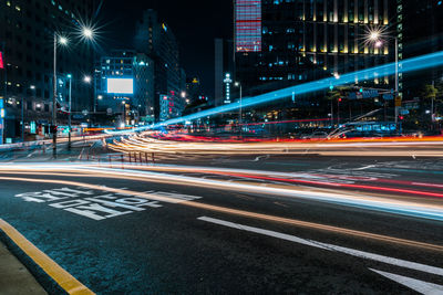 Light trails on city street at night