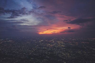 High angle view of buildings against sky during sunset